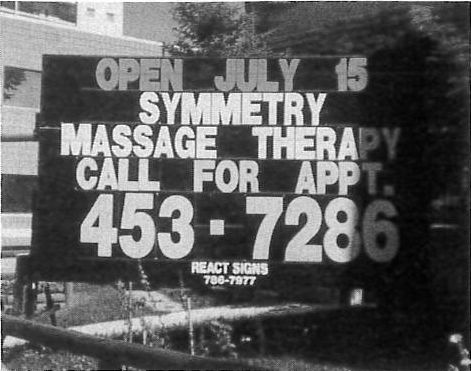 [Advertisement for symmetry massage therapy]
