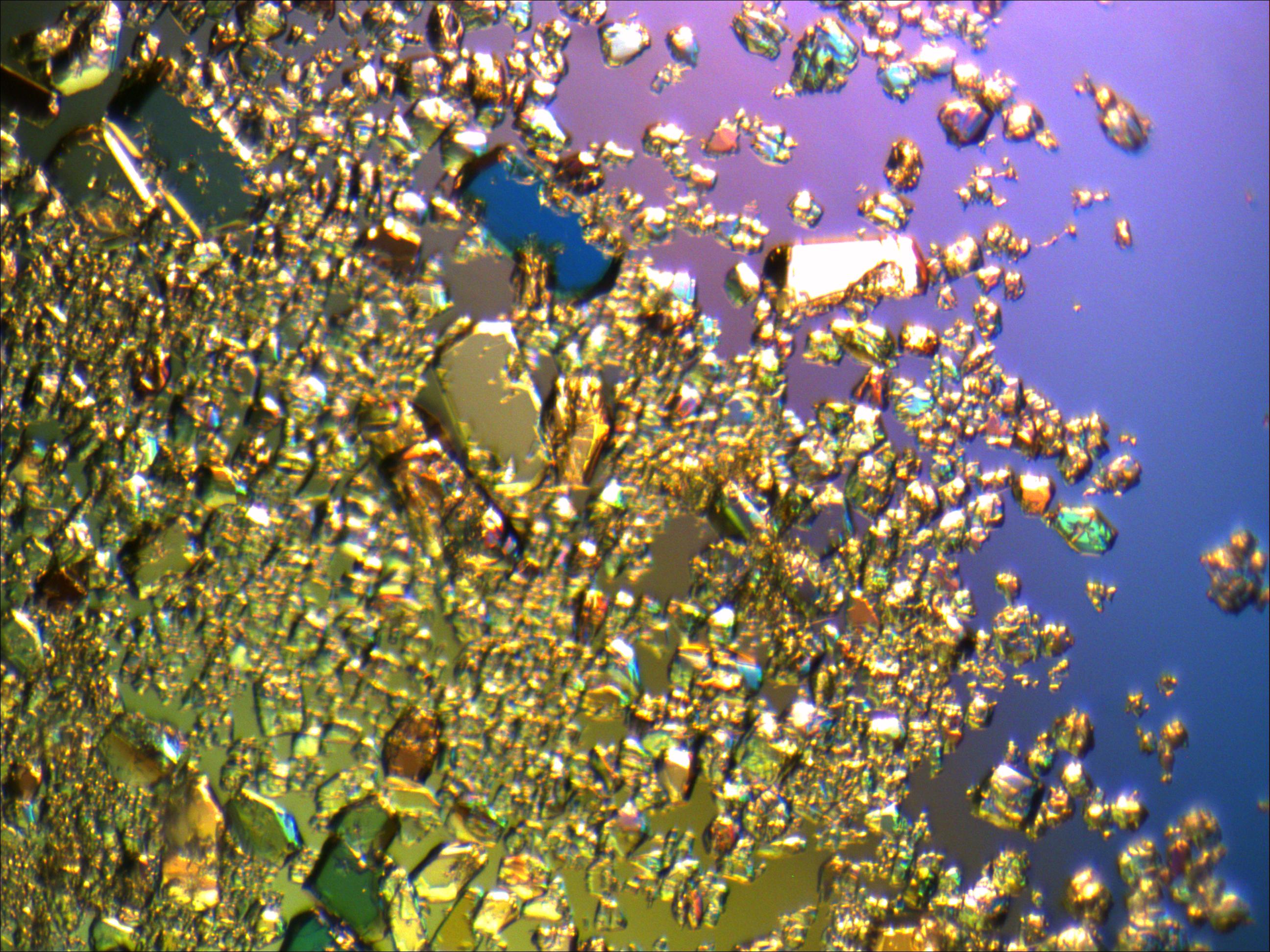 Golden crystals on a blue background