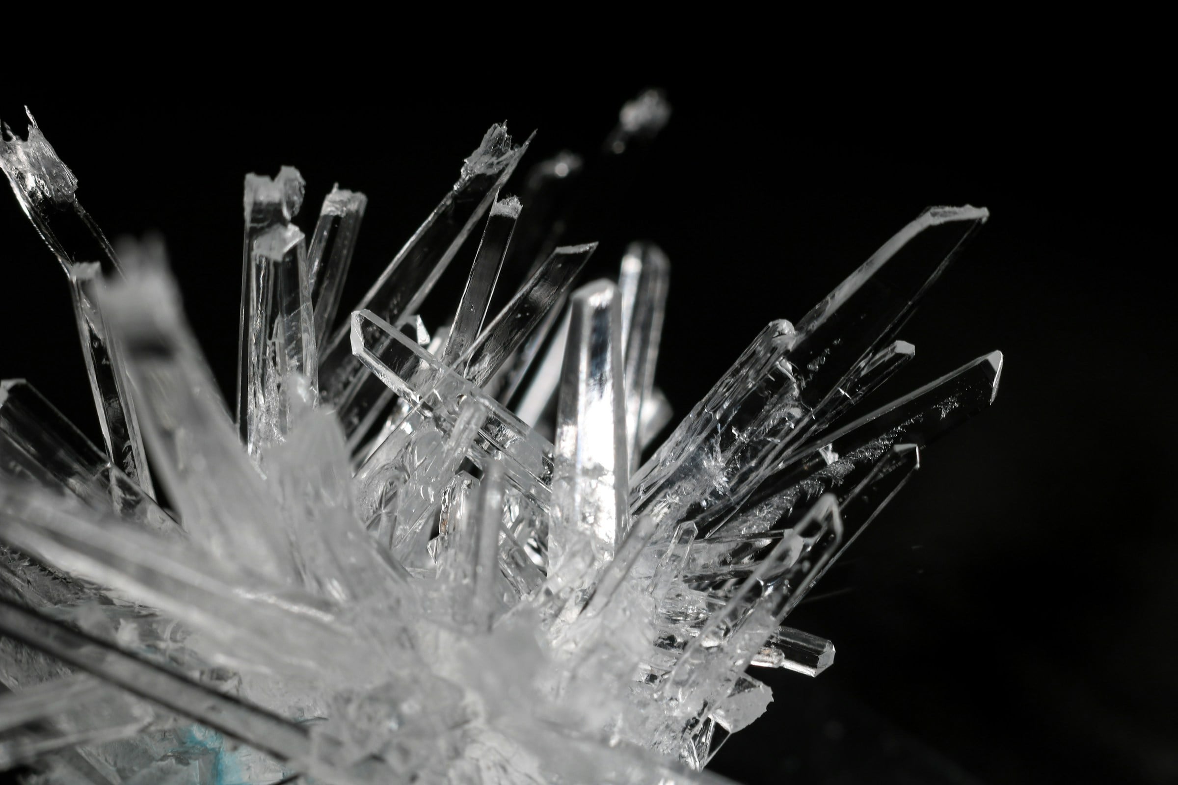 Large clear crystal, dark background