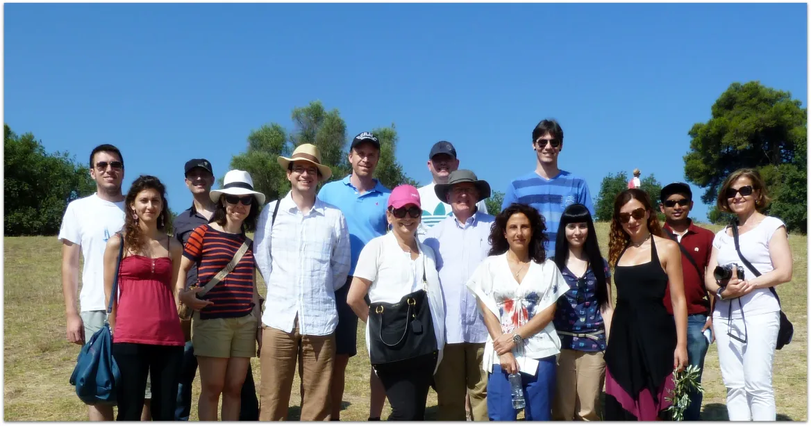 Group of people against a blue sky