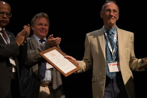 Professor Ted Janssen receives the certificate and medal of the Ewald Prize from IUCr President Gautam Desiraju and Vice-President Claude Lecomte. Professor Aloysio Janner was unable to attend the ceremony at the Montreal Congress.