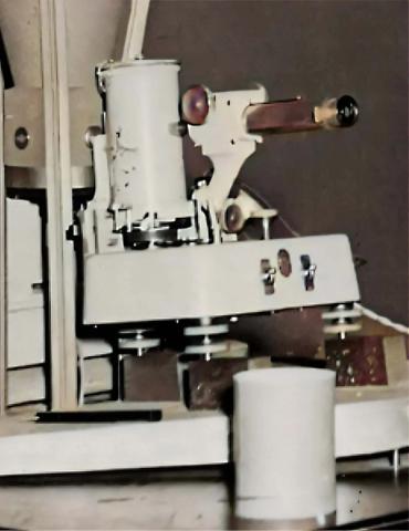 A Unicam rotating crystal camera pushed up against an X-ray window. This type of camera was used by Raymond Gosling at Kings College in London to obtain the first clear DNA photographs for Maurice Wilkins and Rosalind Franklin.
