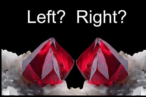 two red crystals with text