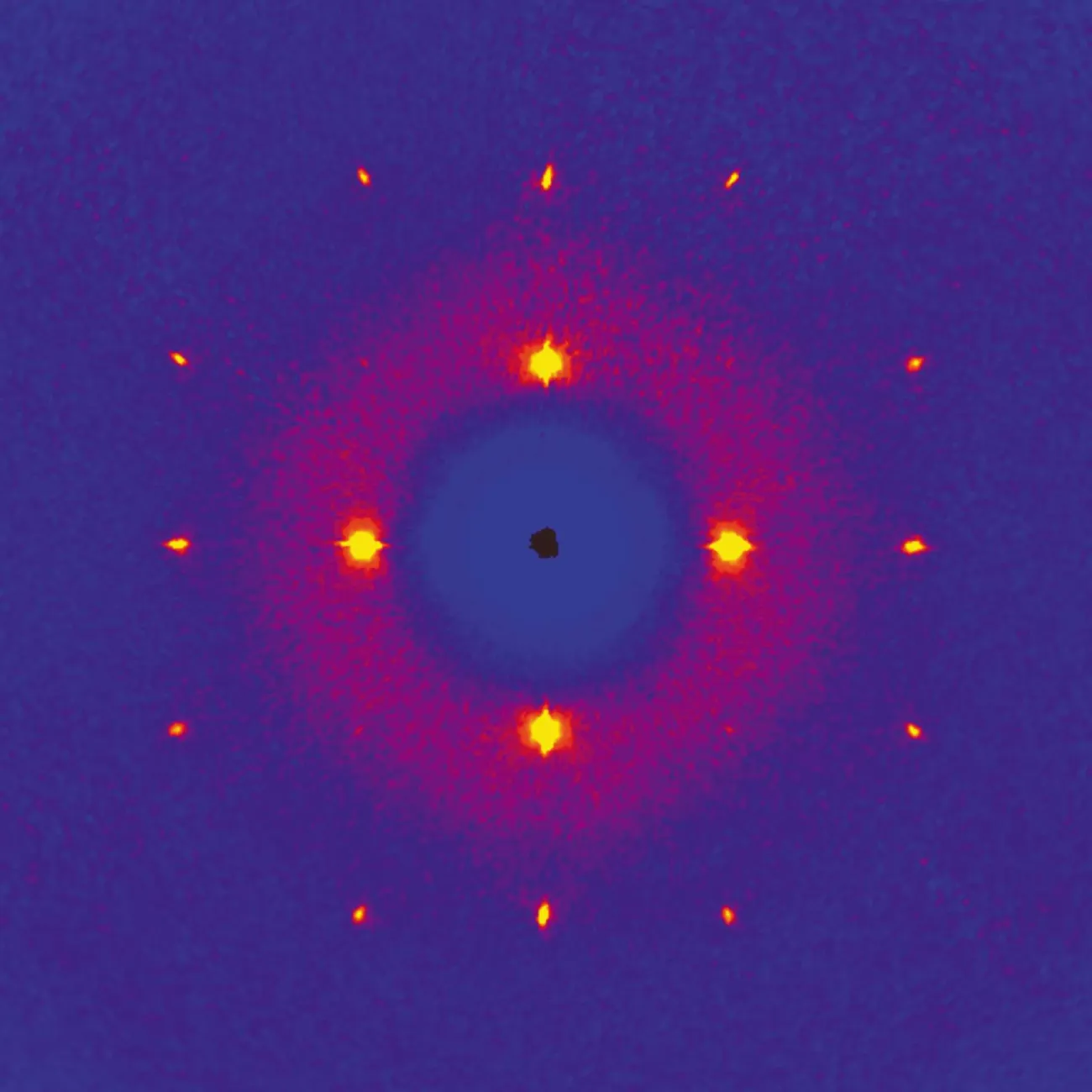The (hk0) layer of reciprocal space for the plastic phase of cyclo­hexane, at 255 K. Direction [100] runs on the right, direction [010] runs upward.