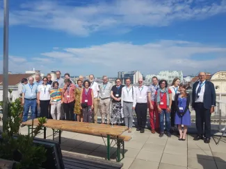 A photo of a group of people on a rooftop
