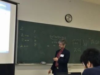 Person at the chalkboard