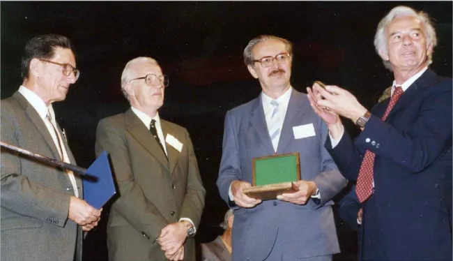 Presentation of the Ewald Prize to John Cowley and Alex Moodie at the Opening Ceremony of the 1987 Perth Congress. Left-right: John Cowley, Alex Moodie, V. I. Simonov, Theo Hahn