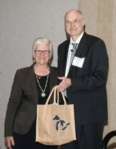 Dmitri Svergun receives his 2018 Guinier Prize from the IUCr SAS Commission's Jill Trewhella.
